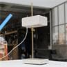TEMPLATE blanc émaillé câble transparent Lampe de bureau Céramique / Laiton H55cm